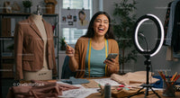 Happy Fashion Designer in Creative Workspace with Mannequin