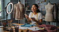 Joyful Fashion Designer in Creative Studio Environment
