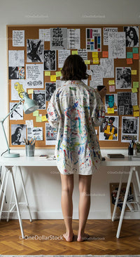 Creative Woman in Colorful Shirt Brainstorming in Home Office