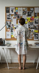 Artist Brainstorming in Home Office with Inspiration Board