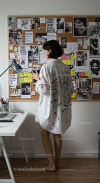 Young Woman Brainstorming in Creative Home Office