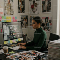 Fashion Editor Working in a Stylish Office with Magazine Covers