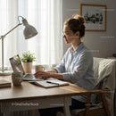 Woman Working on Laptop in Bright Home Office