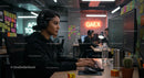 Focused Female Developer Coding in a Modern Office Environment
