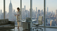 Businesswoman in Modern Office with Breathtaking Cityscape View