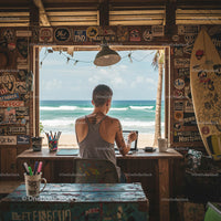 Digital Nomad Working at Island Beachfront Desk