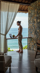 Man Working Remotely with Ocean View in Tropical Setting