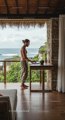 Remote Work in Tropical Waterfront Setting
