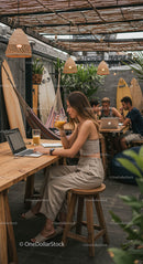 Casual Outdoor Workspace with Surfboards and Hammocks