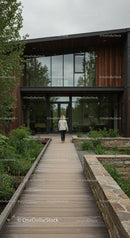 Modern Office Building with Wooden Exterior and Lush Garden