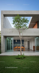 Modern Concrete Home with Tree and Spacious Terrace