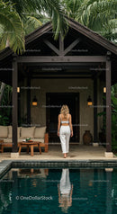 Woman in White by Tropical Poolside Retreat