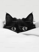 Curious Black Cat Peeking Over a White Blanket