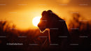 Silhouette of Majestic Lion at Sunset in African Savanna