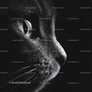 Black and White Close-Up of Cat's Face with Intense Gaze