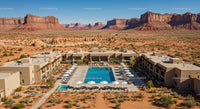 Desert Resort with Pool and Scenic Sandstone Cliffs