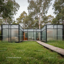 Modern Glass House in Green Natural Setting