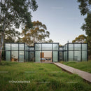 Modern Glass House Surrounded by Lush Green Landscape