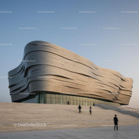 Futuristic Wavy Building Against Clear Blue Sky