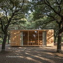 Modern Wooden Cabin in Lush Forest Setting