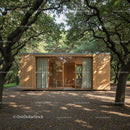Modern Wooden Cabin Amidst Lush Greenery