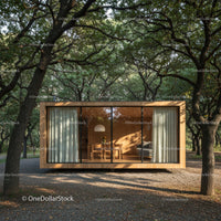 Modern Glass-Walled Cabin in Serene Forest Setting
