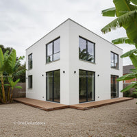 Contemporary White House with Banana Plants and Wooden Deck