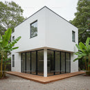 Modern White House with Tropical Garden and Banana Plants
