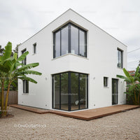 Contemporary White House with Banana Plants and Large Windows