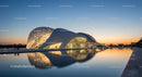 Futuristic Architectural Marvel at Sunset Reflection