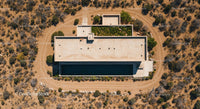 Modern House with Rooftop Garden in Arid Landscape