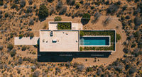 Modern Desert Oasis with Rooftop Pool and Minimalist Design
