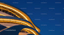 Futuristic Curved Building Illuminated at Night