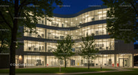 Modern Office Building Illuminated at Night