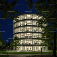 Illuminated Modern Office Building at Night