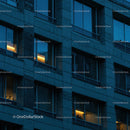 Modern Office Building at Dusk with Illuminated Windows