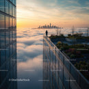 Silhouette on Urban Rooftop Overlooking Skyline at Sunset