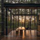 Modern Glass Cabin with Sunset in Forest Setting