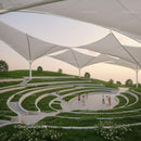 Modern Amphitheater with White Canopy and Green Lawn