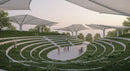 Modern Outdoor Amphitheater with Greenery and Canopies