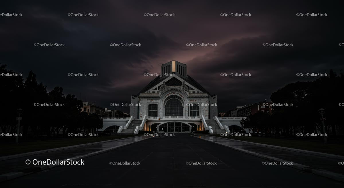 Majestic Building Under Dramatic Evening Sky