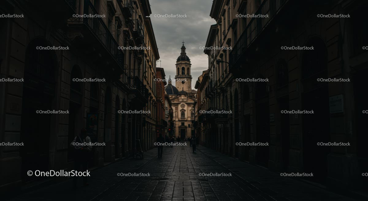 Historyczna europejska ulica prowadząca do barokowego kościoła