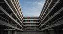 Modern Symmetrical Concrete Building with Open Courtyard