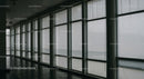 Empty Corridor with Large Windows and Minimalist Design