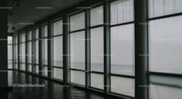 Empty Corridor with Large Windows and Minimalist Design