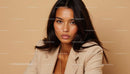Elegant Woman in Beige Blazer with Confident Expression