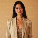 Confident Young Businesswoman in Elegant Beige Suit