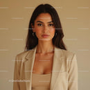 Elegant Woman in Beige Blazer with Confident Expression