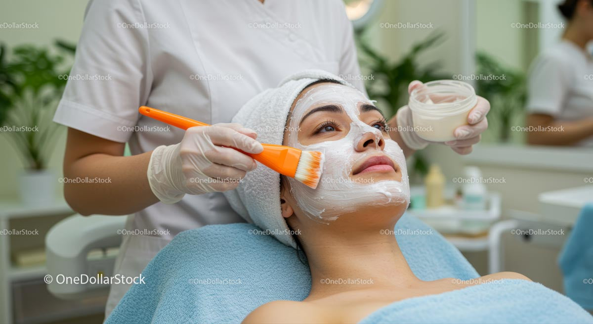 Woman Receiving Facial Treatment at Beauty Spa