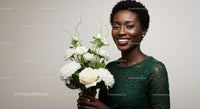 Smiling Woman Holding White Rose Bouquet in Green Dress